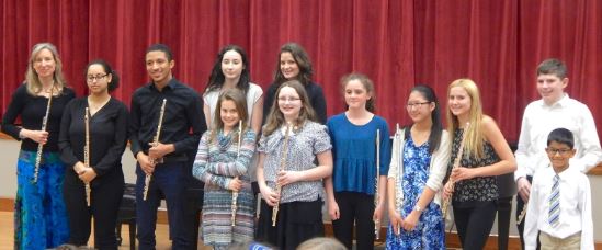 Melissa with group of students after studio recital performance