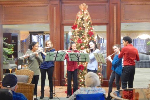 students perform retirement community holiday outreach concert