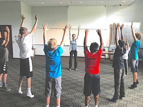 Melissa leads Yoga for Musicians workshop at camp