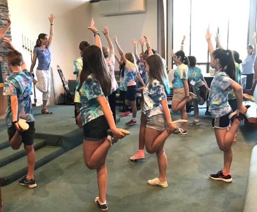 Melissa leads Yoga for Musicians class at camp